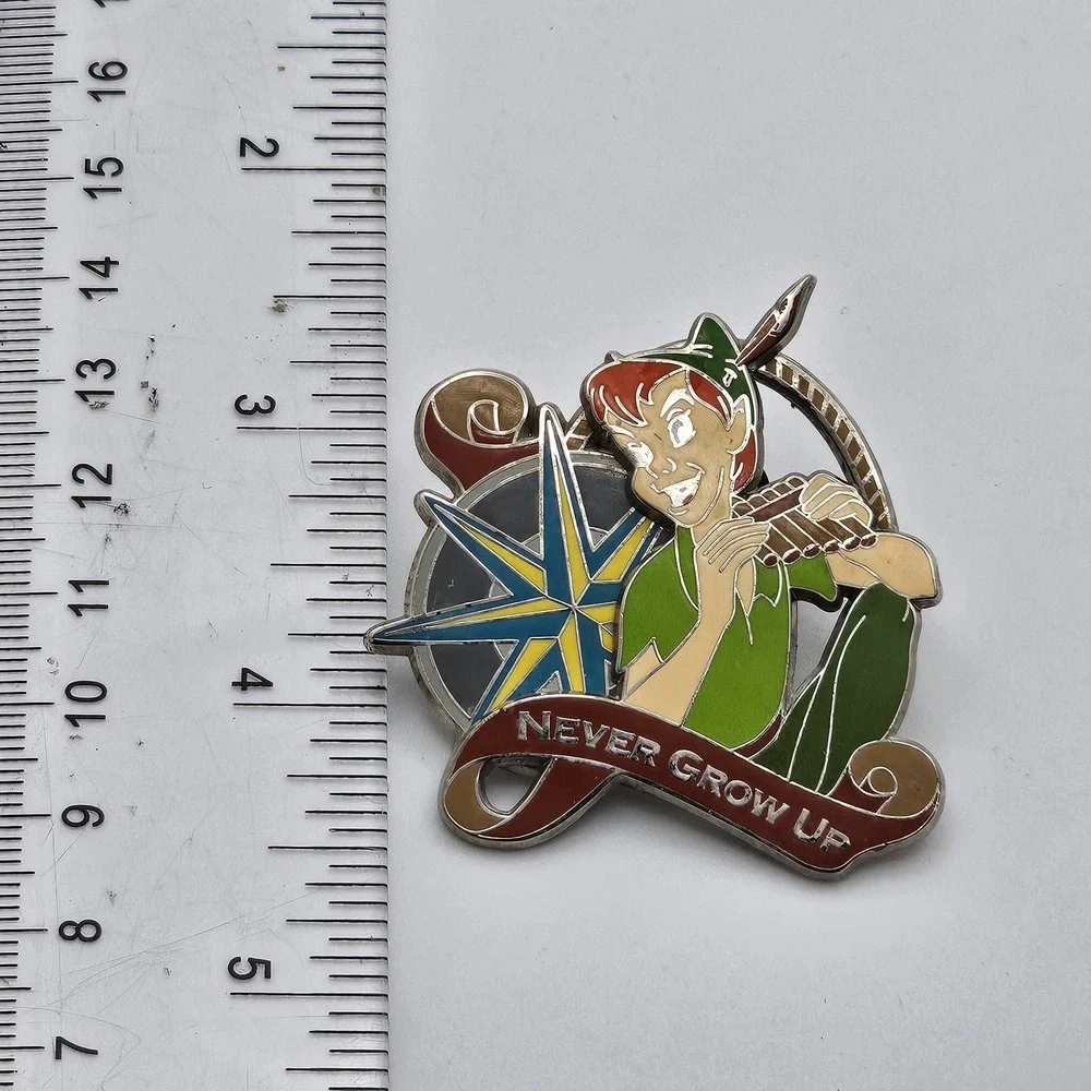 Disney Peter Pan with Pan Pipes & Compass Never Grow Up Trader Pin